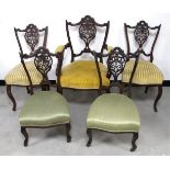 A set of five late 19th Century matching mahogany chairs, including one carver, two side and two