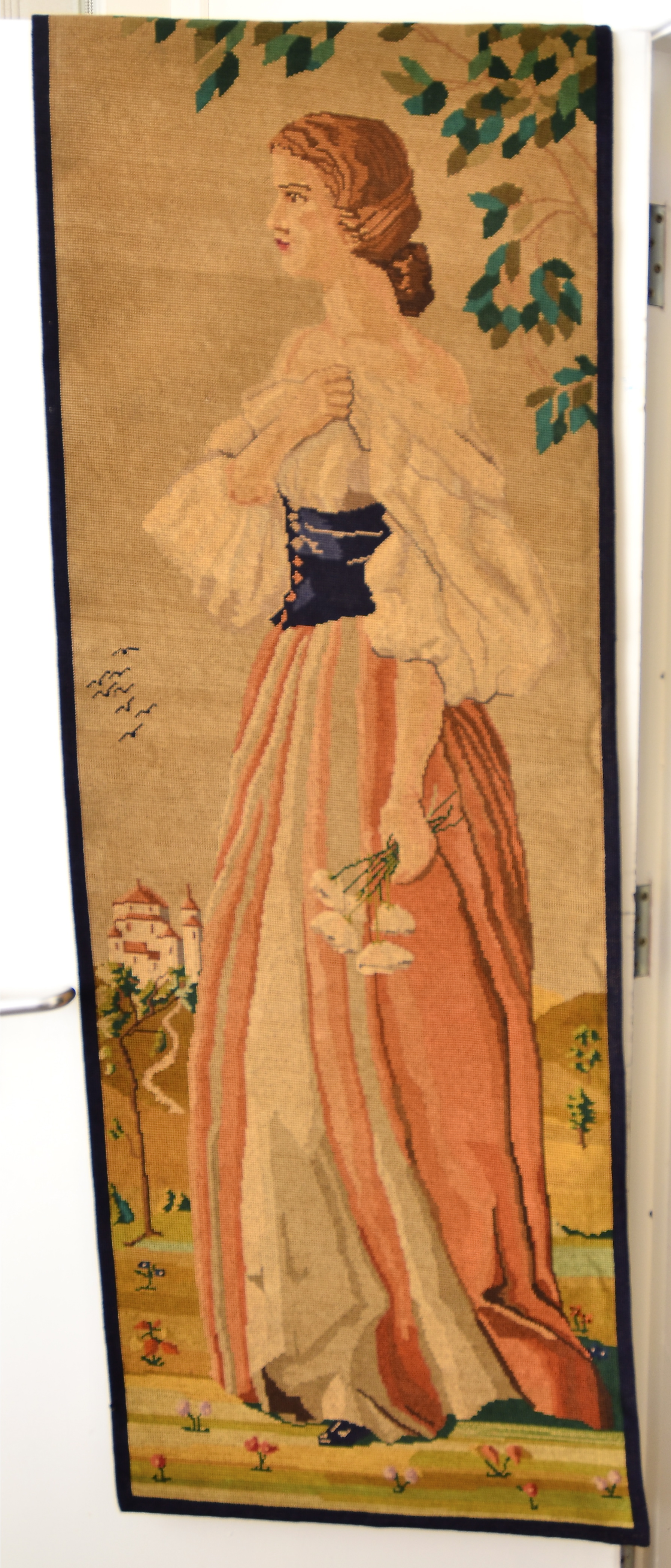 A pair of late 19th/early 20th Century Berlin needlework wall hangings, each depicting a woman in - Image 4 of 4