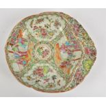 A 19th Century Chinese canton famille rose porcelain moulded dish, the body of the dish decorated