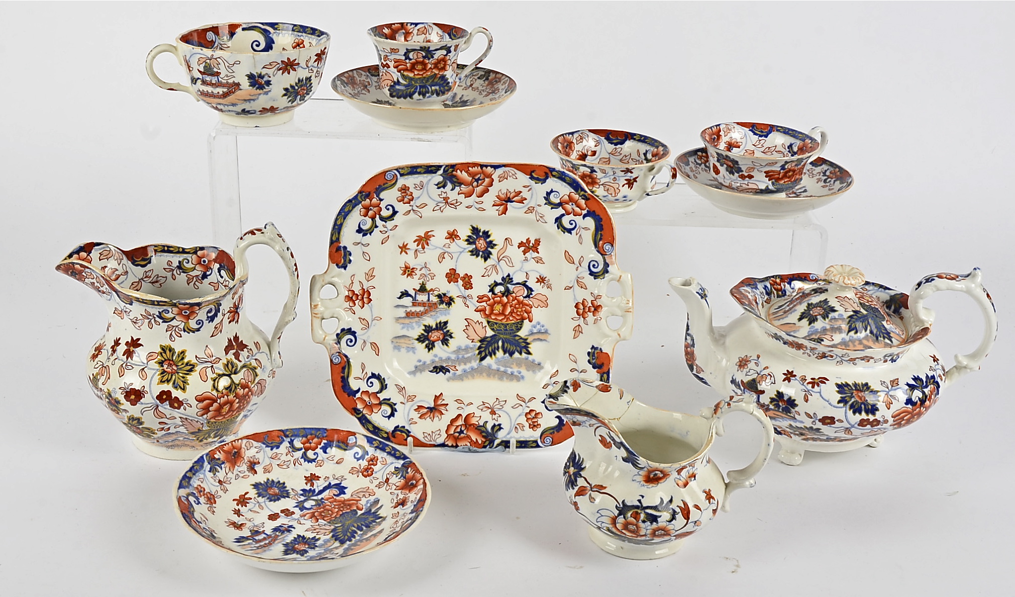 A Victorian dinner service Amherst Japan, considered to be Minton stone china, including a jug,