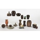 A quantity of serpentine stone wares, including one taking the form of an inkwell, three with