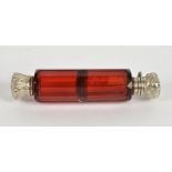 A double ended cranberry glass combination scent bottle, one end twists, one end hinged, length 10.