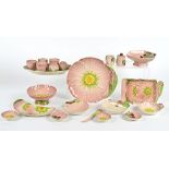 A group of Carlton Ware tablewares in the pink buttercup pattern, to include crescent shaped dishes,