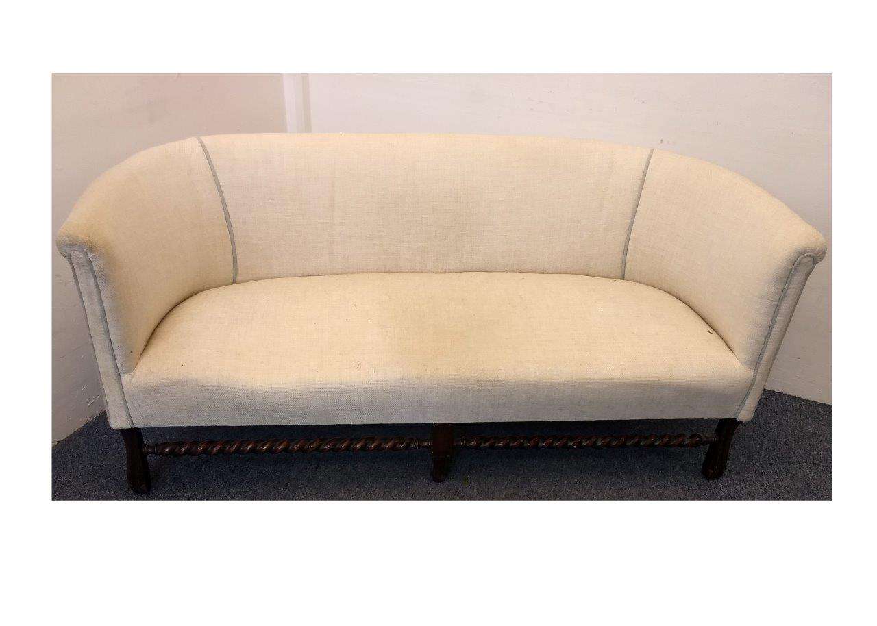 A two seater settee with curved back, mahogany supports with barley-twist stretcher, 155cm wide,