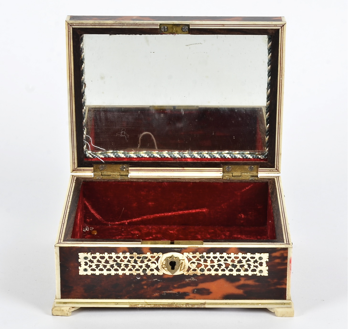 A bone and tortoiseshell box, of Indian origin, raised on four feet, the interior with mirror and - Bild 2 aus 2