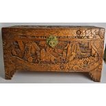 An Oriental camphor wood lined blanket box, with scenes of figures on horseback, 87.5cm x 48cm x