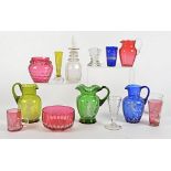 Three Mary Gregory 19th and 20th Century glass jugs, one blue example with a putti, one with a