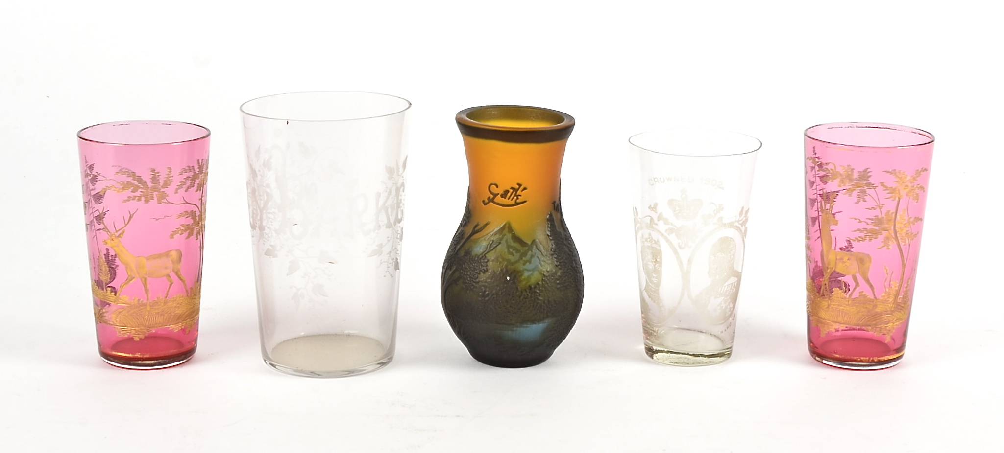An overlaid vase with landscape marked Galle, height 10cm, together with two cranberry glasses