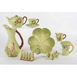 A quantity of Carlton Ware predominantly in the green colourway with floral decoration, including