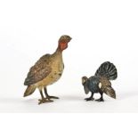 Two early 20th Century cold painted bronze studies of birds, the largest a turkey, height 7.5cm (2)