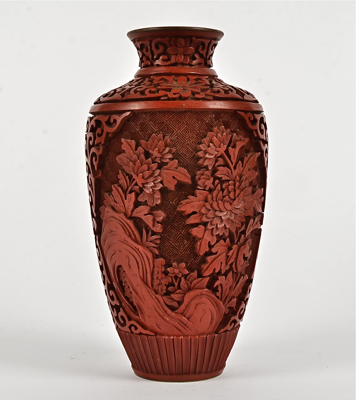 A cinnabar lacquer vase, with a depiction of plantlife rising above rocks, height 21cm - Image 2 of 2