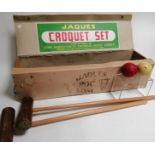 A vintage Jacques croquet set, in original box, consisting of nine balls, four mallets, one stake,