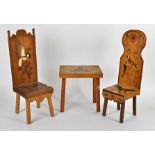 Three items of miniature wooden furniture, including two chairs, with carved decoration of birds and