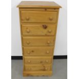 A contemporary pine six drawer tallboy, 51cm x 43cm x 118cm