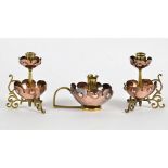 Manner of W.A.S Benson, a garniture of brass and copper Arts & Crafts era candlesticks, based on