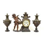 A late 19th/early 20th Century French spelter clock garniture, after L & F Moreau, titled 'Enfant au