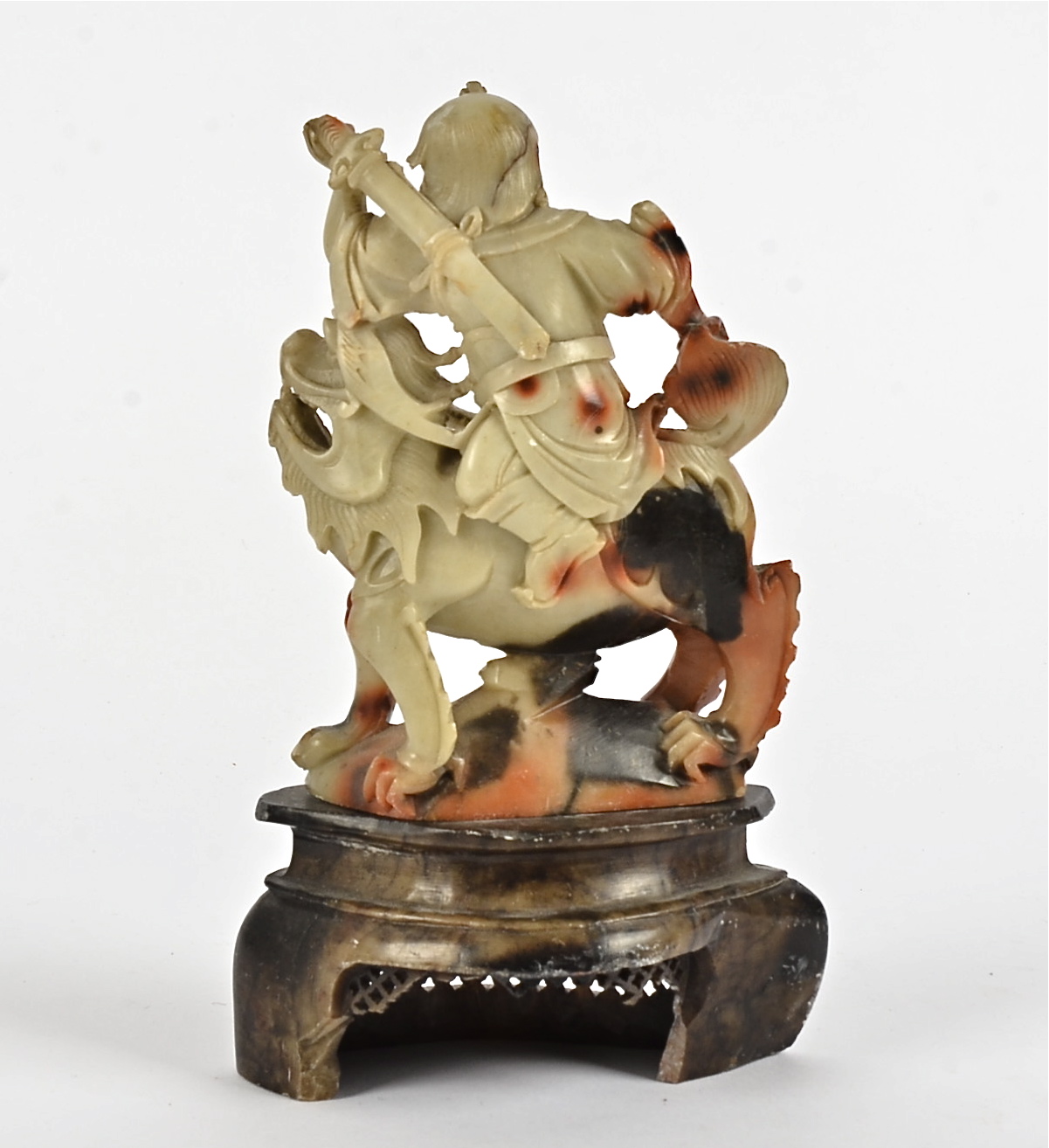 A 19th Century Chinese soapstone carved figure, modelled as a seated warrior upon a mythical - Image 2 of 2