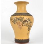 A Japanese terracotta vase, with incised decoration of a pair of birds perching on a branch,