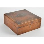 A walnut box, with red padded interior, 20.5cmx 20.5cm x 8.5cm