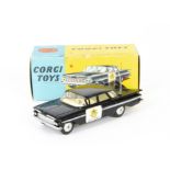 A Corgi Toys 223 Chevrolet State Patrol, black body, lemon interior, grey aerial, flat spun hubs, in