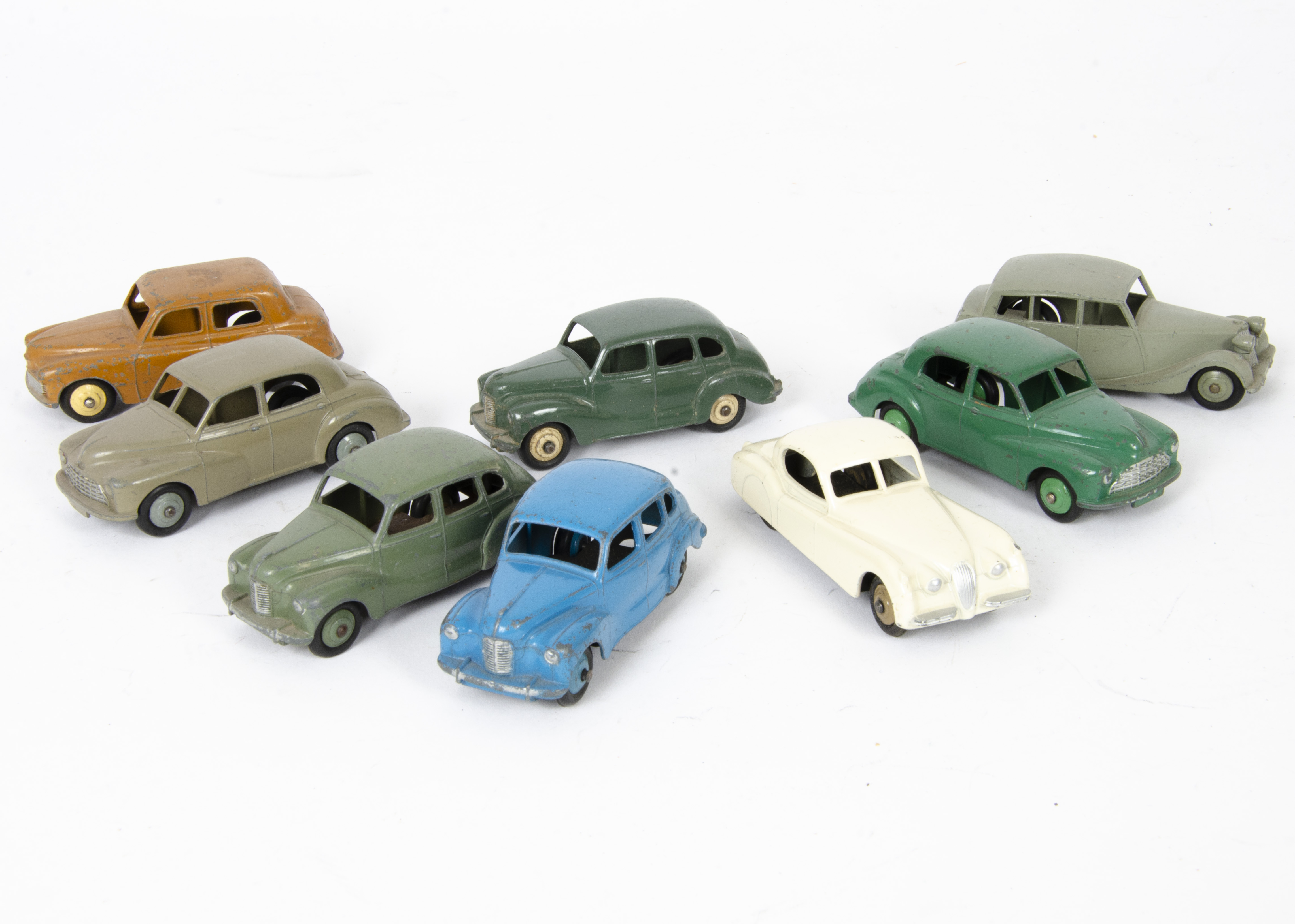 1950s Dinky Toy British Cars, Austin Devon (3), first light blue body and hubs, second suede green