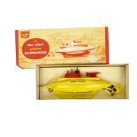 A Sutcliffe Model Tinplate Clockwork Sea Wolf Atomic Submarine, yellow body, red plastic fittings,