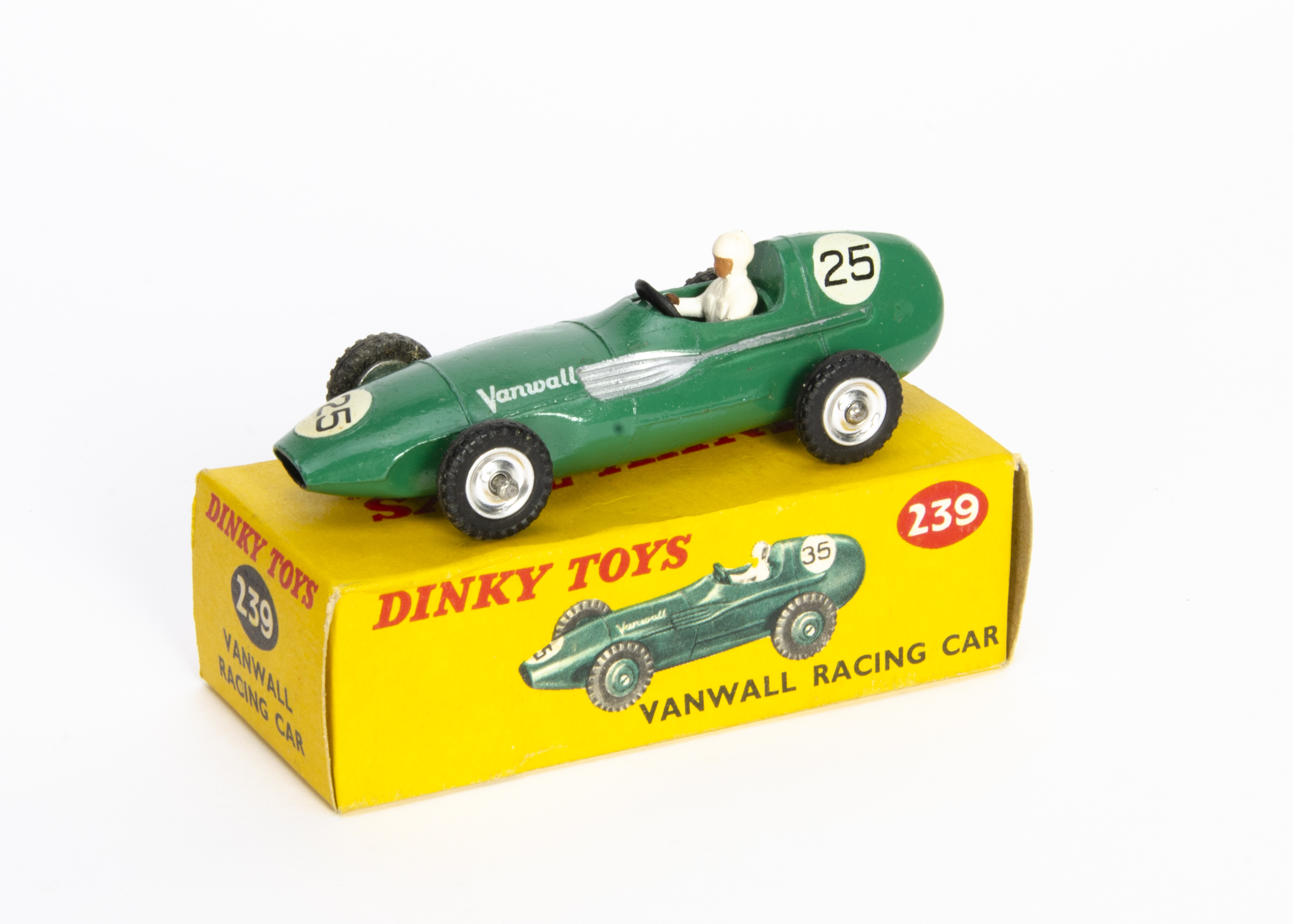 A Dinky Toys 239 Vanwall Racing Car, green body, white driver, black gloss base, RN25, spun hubs, in