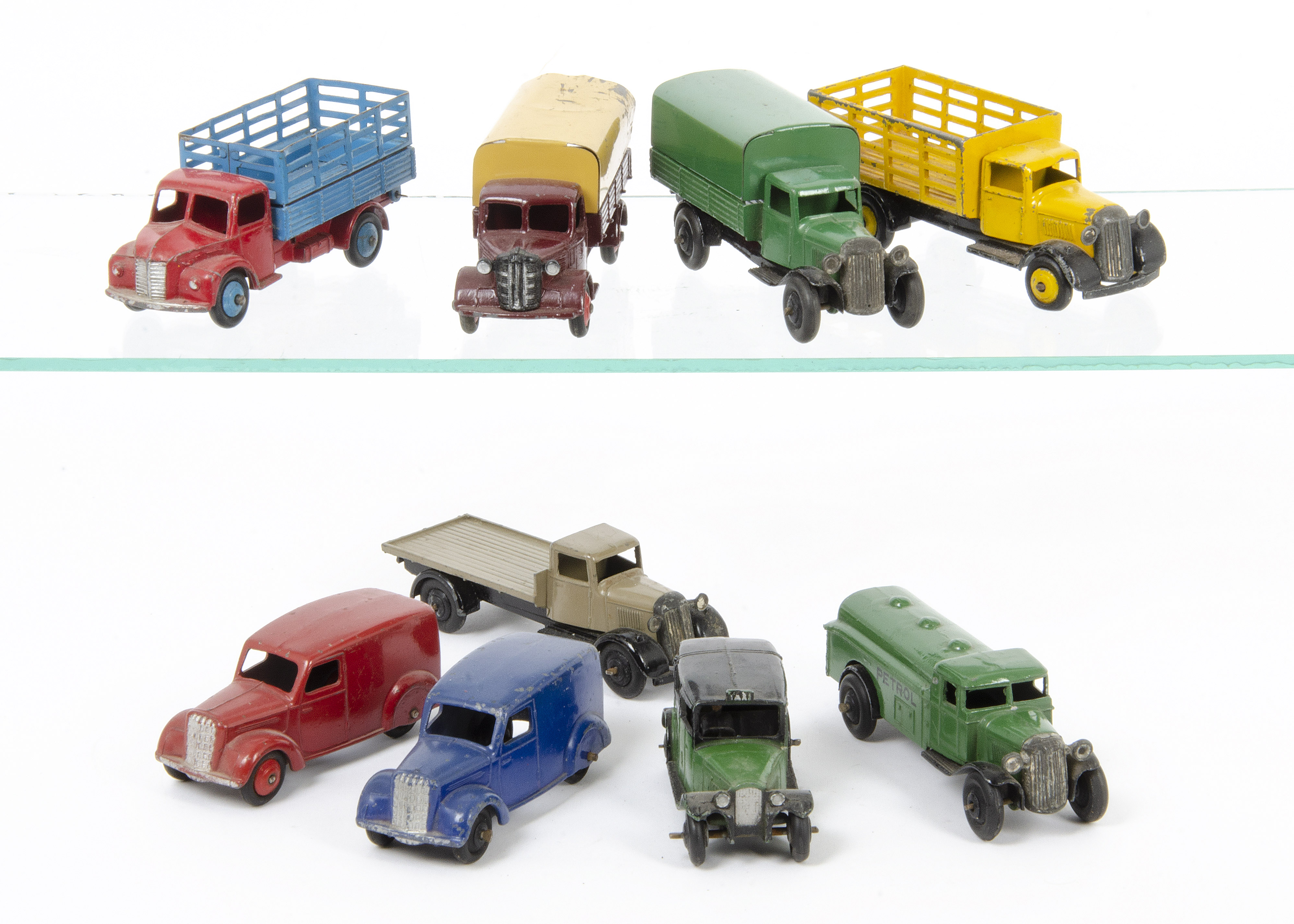 Dinky Toy Small Commercials, including 25d Petrol Tank Wagon, green body, type 3 black chassis,