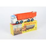 A Dinky Toys 925 Leyland Dump Truck With Tilt Cab, white cab and chassis, orange diecast tipper,