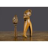 A carved wooden grotesque head nutcracker, with screw-action handle —7in. (17.5cm.) high (chip to