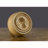 A large 19th Century wooden butter stamp carved with a wheatsheaf, plunger type —5¼in. (13.5cm.)