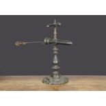 An unusual 19th Century cast-iron double goffering iron, probably British, with scrolling base,