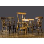 Six doll’s country kitchen chairs, a near-pair of late 19th Century varnished wooden chairs —10½