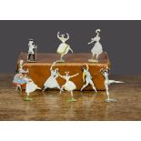 A small collection of early 19th Century dancing figures in the style of Sohlke of Berlin, 50-55mm