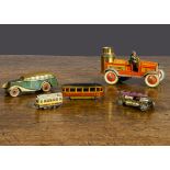 German Penny Toy and other vehicles, a clockwork fire pump lithographed with man —4½in. (11.5cm.)