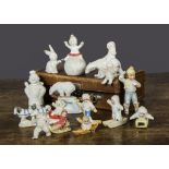 Bisque Snow Baby and other frosted cake decorations, a Snow Baby hiding from a polar bear who is