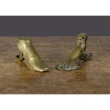 Two human foot brass paper clips, one pressed brass left foot with tassels at ankle with