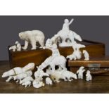 Bisque polar bear cake decorations, a well modelled polar bear on all fours —4¾in. (12cm.) long, two