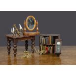 Dolls’ house furniture, a mahogany extendable table with turned legs —5¾in. (14.5cm.) long (