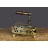 A cast-iron box iron, with turned wooden handle, drop-in-the back slug and pierced brass stand —6in.