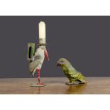 A German lead parrot pen wipe, painted mainly green, standing on feet —3¾in. (9.5cm.) high (