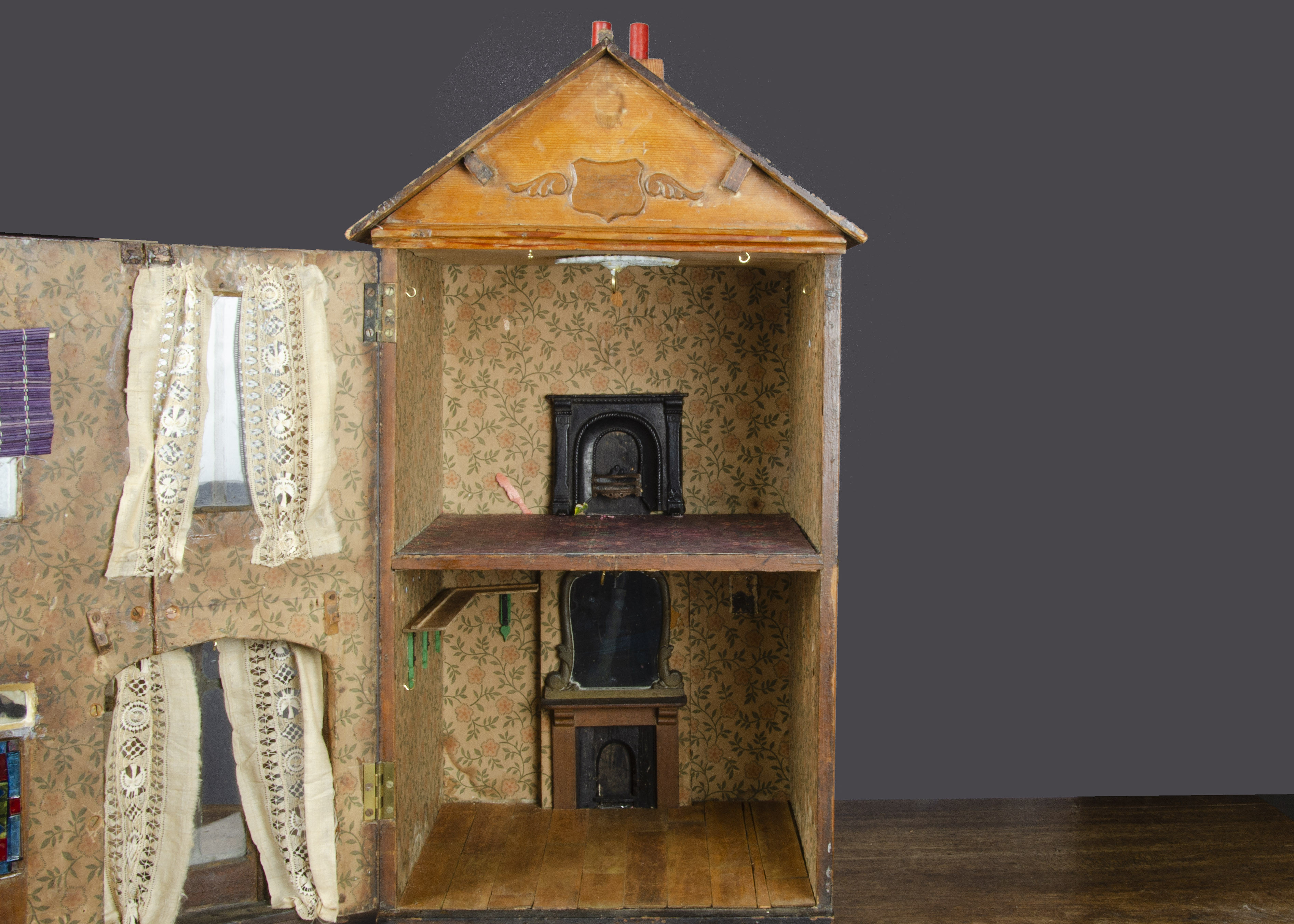 A small late 19th Century English wooden dolls’ house, pine construction with bay window, dummy - Image 2 of 2