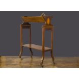 A small portable library shelf circa 1900, Sheraton-style, inlaid mahogany, on brass and pottery