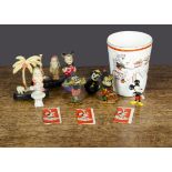 Disney items, two two-dimensional lithographed tinplate Mickey Mice —2¼in. (5.5cm.) high, a