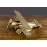 A Günthermann Amy Queen of the Air 'Jason' clockwork tinplate bi-plane, lithographed pale gold