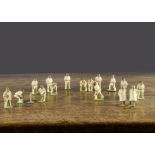 A Pixyland Kew pre-WW2 complete set of 45mm Cricketers, comprising two umpires, two batsmen,