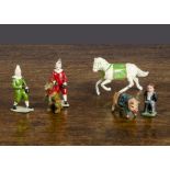 Circus items by Britains and others, including a rare John Hill pig in jacket, Britains tub and