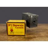 An Eastman Kodak Co Brownie Camera No 2, instructions, In original yellow box illustrated with a
