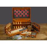 A late 19th Century mahogany games compendium, with turned wooden chess set, draughts, dominos, lead