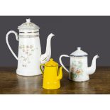 Three enamel coffee pots, the largest Austrian with percolator and floral transfer decoration —9¾in.